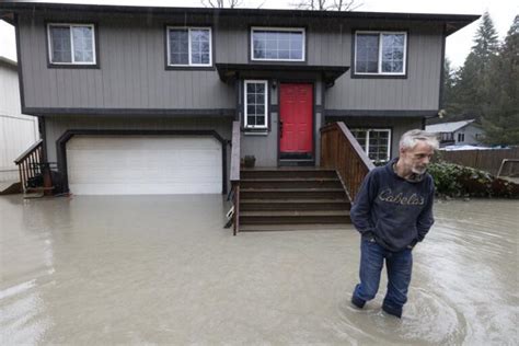 Atmospheric river soaks Pacific Northwest with record-breaking rain and warm winter temperatures